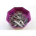 A tub of vintage sewing and needlework metal scissors, various makers including Rodgers Sheffield,