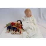 Four vintage Dolls to include Oriental examples