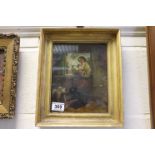19th century a gilt framed oil painting of a country girl reading a book in a cottage, signed and