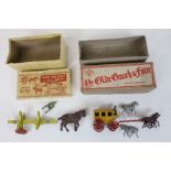 A boxed Modern Product diecast Coach Driver and Four Horses with a boxed diecast Benbros Qualitoy