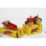 Boxed Dinky 300 Massey Harris Tractor in vg condition with driver, inner packaging, box gd and a