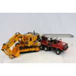 Meccano Mogul Fire Fighter (play worn) together with New Bright CAT 245D Hydraulic Crane