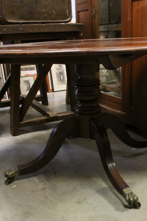 19th century Oval Tilt Top Loo / Centre Table raised on a turned column support and four reeded - Image 2 of 2