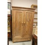 Pine Wardrobe with Two Panel Doors opening to reveal shelf and hanging rail above a single drawer