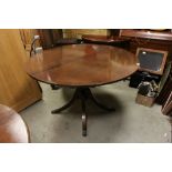 Reproduction Regency Extending Dining Table with additional leaf raised on a central column with