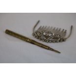 A brass propelling pencil stamped Perry & Co, geometric chequerboard style decoration to case