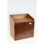 Wooden Table Top Cabinet with Galleried Back and Two Doors opening to reveal Shelves