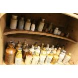 Collection of stoneware bottles to include approximately 26 Ginger Beer bottles