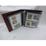 Album of Stamp presentation packs and FDC's to include; Silk Cover Collection and Coin covers