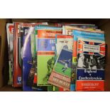 Good collection of 125 England home and away football programmes from the 1950s onwards