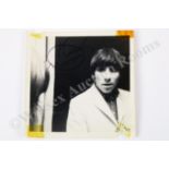 Music Autographs - The Who - a candid photograph of drummer Keith Moon, signed in biro pen to the