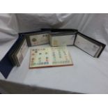 Collection of stamps in two Stanley Gibbons albums and one stock book, includes UK Regional