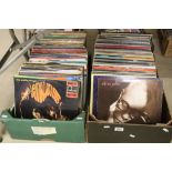 Large collection of over 200 vinyl LP's and 12" singles from various decades and genres to include