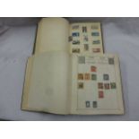 Two stamp albums to include The Worldwide Stamp Album and The Byron Stamp Album with world stamps,