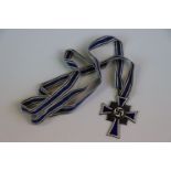 A WW2 German Third Reich Silver & Enamel Mothers Cross Medal With Original Ribbon.