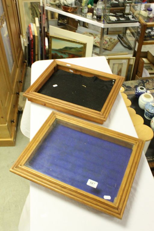 Two wooden framed table top display case