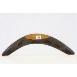 Vintage Aboriginal Boomerang decorated with Kangaroo and Emu Carvings