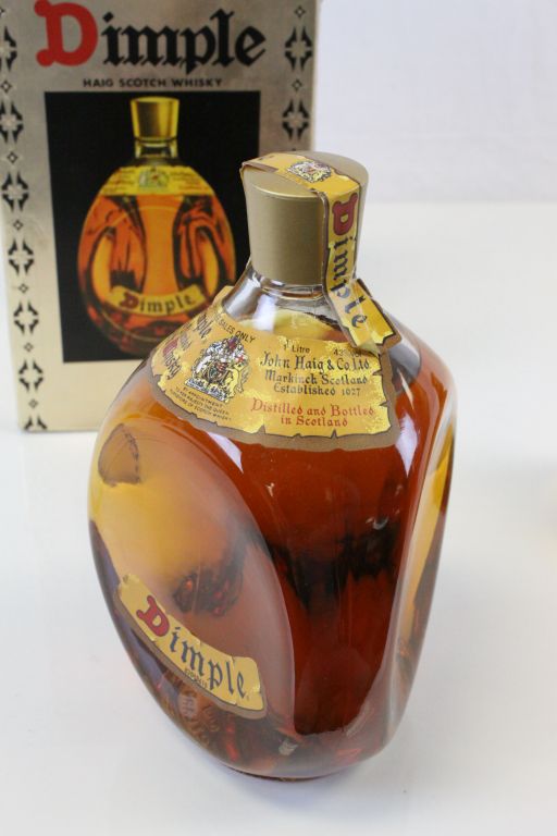 A boxed unopened bottle of Dimple Old Blended Scotch Whisky together with a bottle of Bells Old - Image 2 of 4