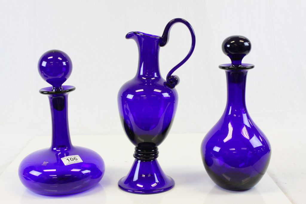 Three large boxed items of Bristol Blue Glass to include two Decanters and an Ewer