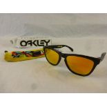 Boxed Oakley Frogskins Valentino Rossi Signature Series sunglasses with polished black frames and