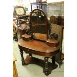 Victorian Mahogany Duchess Dressing Table, the Large Swing Mirror held by Carved Scroll Supports