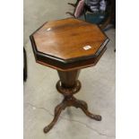 Victorian Walnut Octagonal Sewing Table raised on Carved Tripod Legs