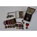 A Collection Of WW2 Medals To Include A Full Size Defence Medal, British War Medal, 1939-1945 Star