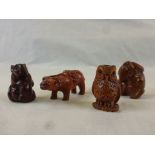 Four miniature wooden netsukes to include mouse, money cow, monkey and an owl