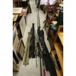 Collection of mainly modern Fishing Rods, some in fishing rod bags