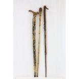 Three vintage walking sticks to include a Bamboo example