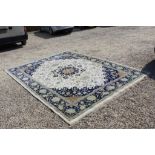 Large Blue, Orange, White and Beige Ground Rug with floral pattern, approx. 398cms x 297cms