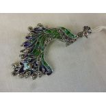 Silver and plique a jour peacock brooch / pendant inset with amethysts