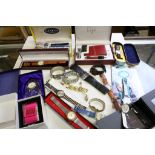A box of mixed collectables to include pen watch and notepad set, Venom wristwatch, Royal Doulton