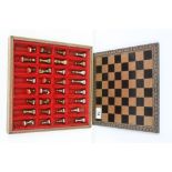 White and Gilt Metal Chess Set contained in a Box with Chess Board Lid