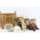 Wicker Basket with Stoneware jars and Jelly Moulds plus a Lacquered box in the shape of a Tortoise