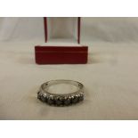 A 14ct white gold black diamond ring