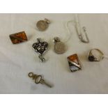 A small collection of jewellery to include a pair of amber silver earrings, comprising yellow