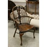18th century Style Elm Seated Windsor Hoop and Stick Back Elbow Chair raised on cabriole legs with