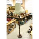 Pair of Early 20th century Oak Barley Twist Standard Lamps with Matching Green Shades and Tassles