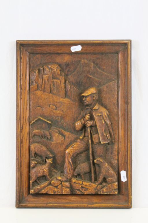 Black Forest Wooden plaque carving in heavy relief of a Shepherd with Flock