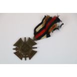 A WW1 German Hindenburg Cross With Swords Medal With Original Ribbon.