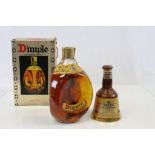 A boxed unopened bottle of Dimple Old Blended Scotch Whisky together with a bottle of Bells Old