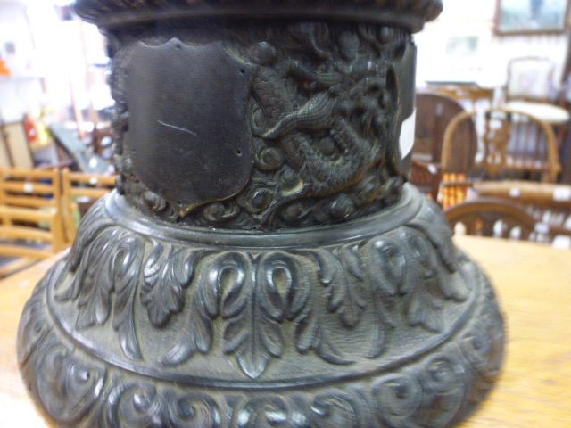 Oriental Hardwood stand with Dragon & shield carving - Image 5 of 7