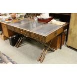 Campaign Style Teak Writing Desk with Triple Black Leather Inset Panels to top, Brass Mounts, the