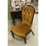 Victorian Ladies Parlour Chair with Button Back and raised on turned legs with castors