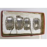 Set of Four Silver Plate Decanter Labels