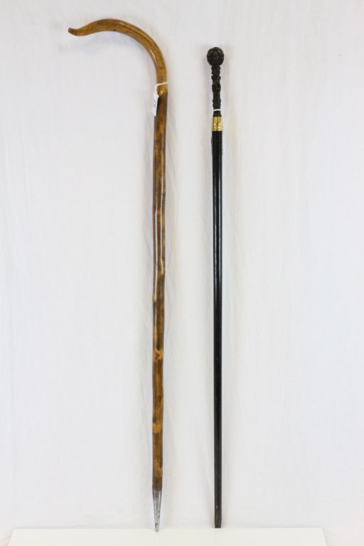 Wooden walking stick with a crook style handle and spike end plus Black finished vintage walking