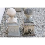 Pair of Reconstituted Stone Ball Finials stood on Square Bases