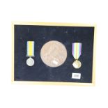 A WW1 British Full Size Medal Pair To Include The Victory Medal And The British War Medal As Well As