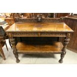 Late Victorian Heavily Carved Oak Two Tier Buffet, the upstand with central carved lion mask above